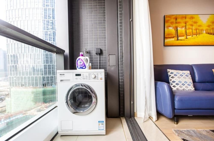 Imagen de la habitación del Hotel Shengang Executive Apartment - Qian Hai Da Xin Metro Station Branch. Foto 3