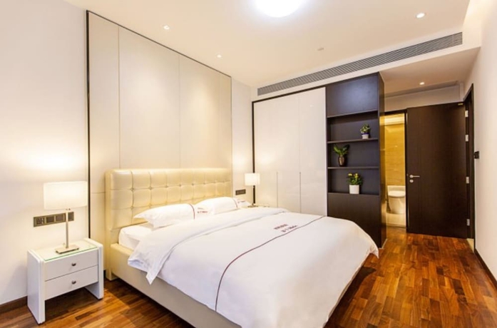 Imagen de la habitación del Hotel Shengang Executive Apartment - Qian Hai Da Xin Metro Station Branch. Foto 9