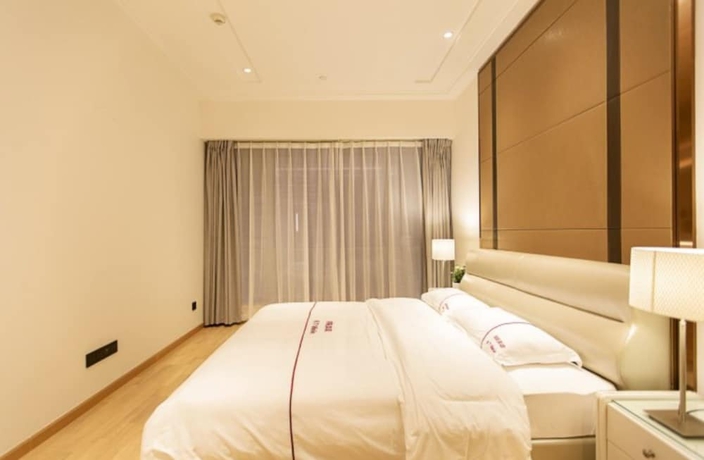 Imagen de la habitación del Hotel Shengang Executive Apartment - Qian Hai Da Xin Metro Station Branch. Foto 11