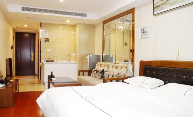 Imagen de la habitación del Hotel Shengang Executive Apartment - Shenzhen The Mixc. Foto 7
