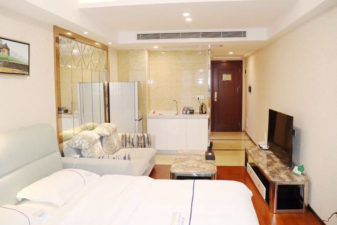 Imagen de la habitación del Hotel Shengang Executive Apartment - Shenzhen The Mixc. Foto 9