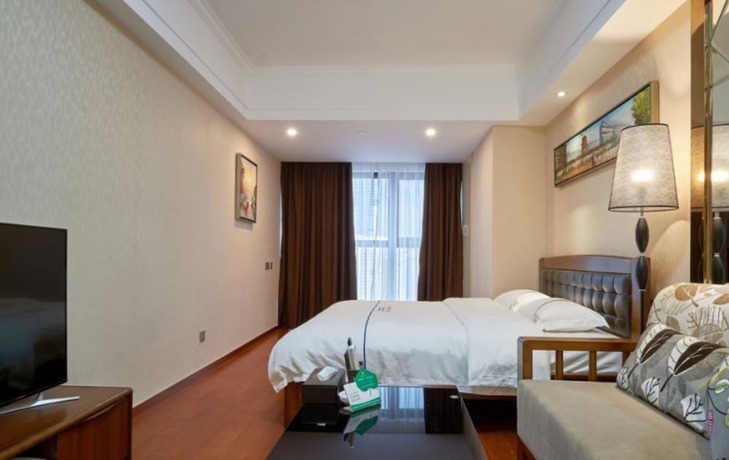 Imagen de la habitación del Hotel Shengang Executive Apartment - Shenzhen The Mixc. Foto 12