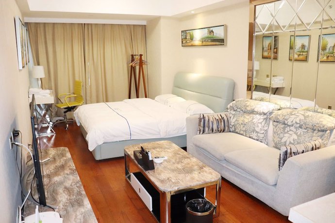 Imagen de la habitación del Hotel Shengang Executive Apartment - Shenzhen The Mixc. Foto 13