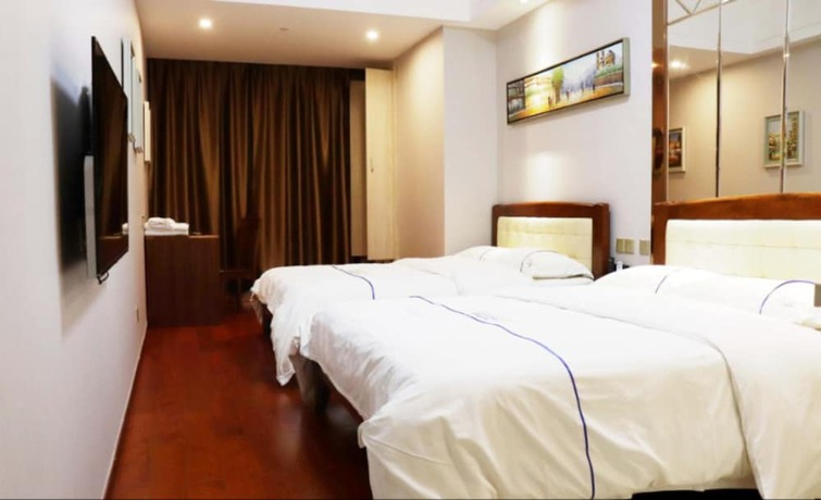 Imagen de la habitación del Hotel Shengang Executive Apartment - Shenzhen The Mixc. Foto 15