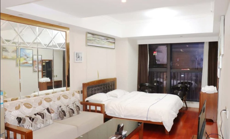 Imagen de la habitación del Hotel Shengang Executive Apartment - Shenzhen The Mixc. Foto 17