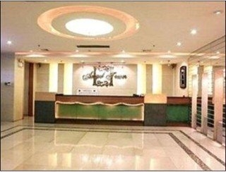 Imagen de la habitación del Hotel Shengdi. Foto 4