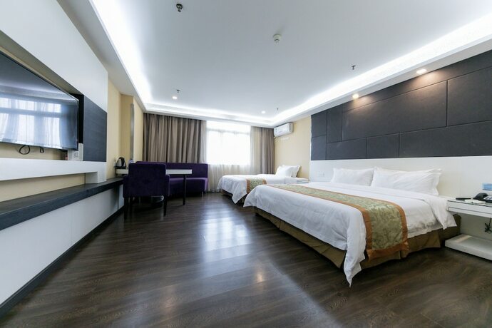 Imagen de la habitación del Hotel Shenggao Chain. Foto 14