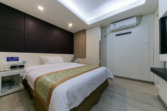 Imagen de la habitación del Hotel Shenggao Chain. Foto 18
