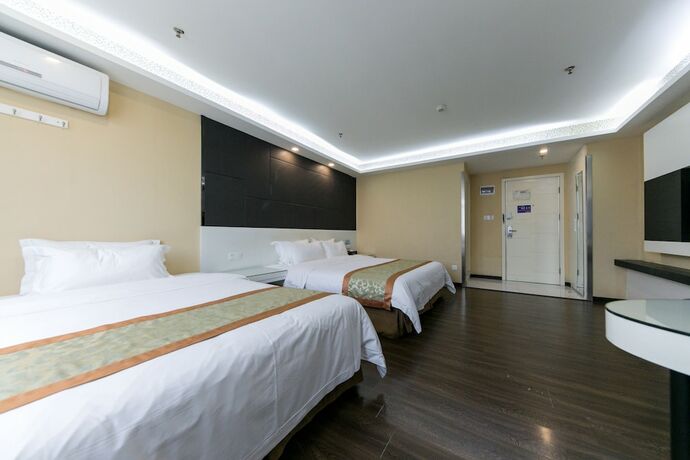Imagen de la habitación del Hotel Shenggao Chain. Foto 19