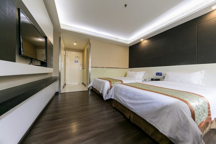 Imagen de la habitación del Hotel Shenggao Chain. Foto 20
