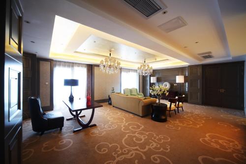 Imagen de la habitación del Hotel Shenglong Jianguo Haiyang. Foto 7