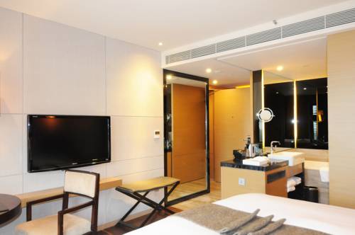 Imagen de la habitación del Hotel Shenzhen Dameisha Kingkey Palace. Foto 3