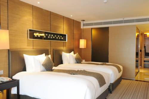 Imagen de la habitación del Hotel Shenzhen Dameisha Kingkey Palace. Foto 4