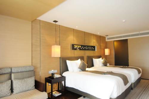 Imagen de la habitación del Hotel Shenzhen Dameisha Kingkey Palace. Foto 5