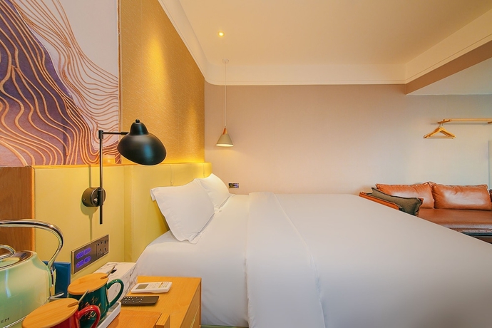 Imagen de la habitación del Hotel Shenzhen East Railway And Buji Subway Station Ranch. Foto 2
