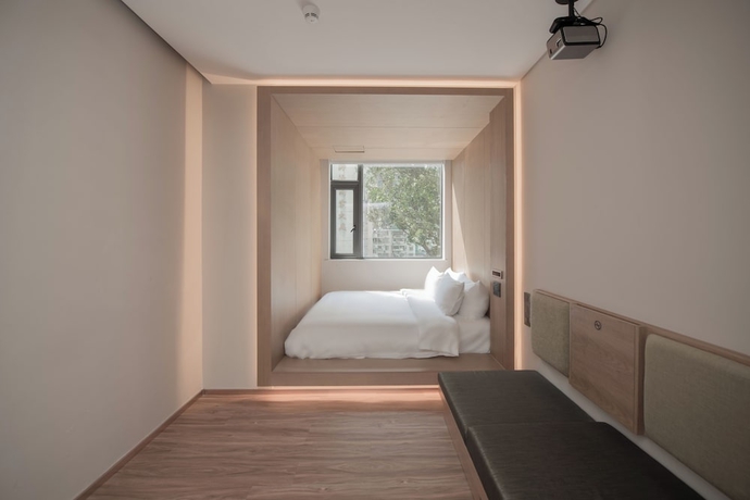Imagen de la habitación del Hotel Shenzhen Enjoy. Foto 4