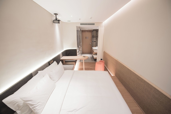 Imagen de la habitación del Hotel Shenzhen Enjoy. Foto 6
