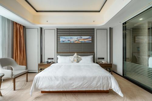 Imagen de la habitación del Hotel Shenzhen Estern Banshan. Foto 8