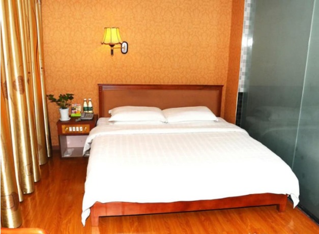 Imagen de la habitación del Hotel Shenzhen Fubanhao. Foto 8