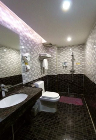 Imagen de la habitación del Hotel Shenzhen Fubanhao. Foto 10
