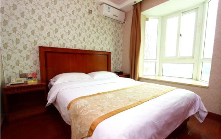Imagen de la habitación del Hotel Shenzhen Fubanhao. Foto 13