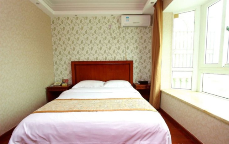 Imagen de la habitación del Hotel Shenzhen Fubanhao. Foto 16