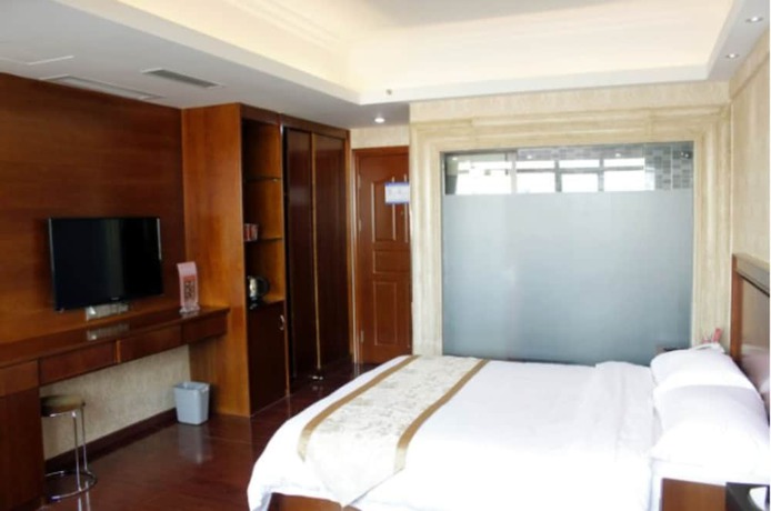 Imagen de la habitación del Hotel Shenzhen Fubanhao. Foto 18
