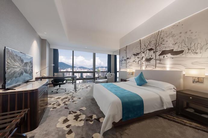 Imagen de la habitación del Hotel Shenzhen Huaqiang Plaza. Foto 2