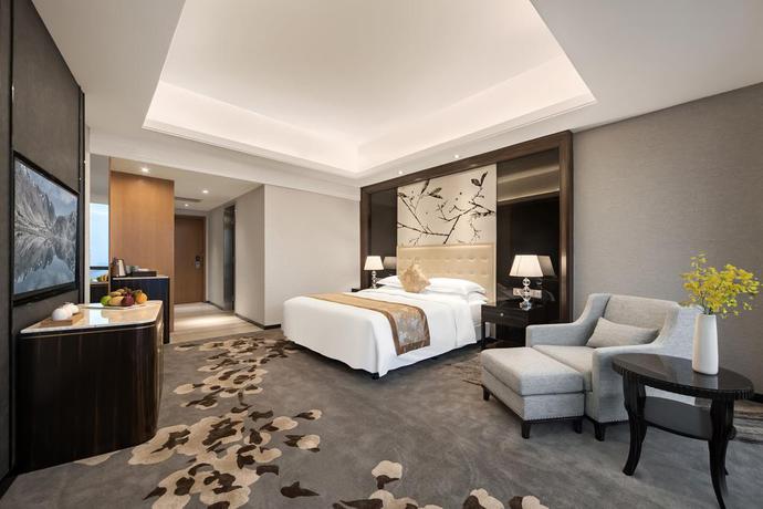 Imagen de la habitación del Hotel Shenzhen Huaqiang Plaza. Foto 3