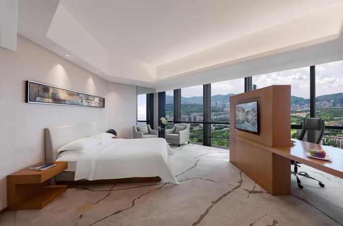 Imagen de la habitación del Hotel Shenzhen Huaqiang Plaza. Foto 4