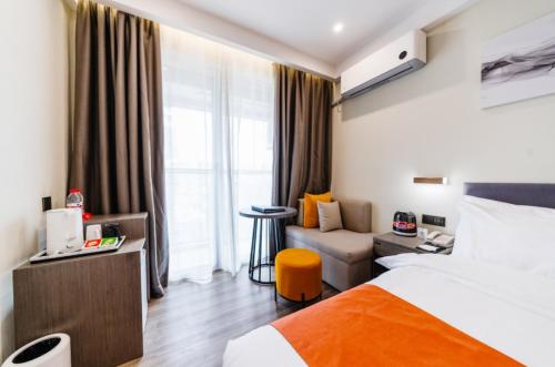 Imagen de la habitación del Hotel Shenzhen Kingkey Kingyu. Foto 18