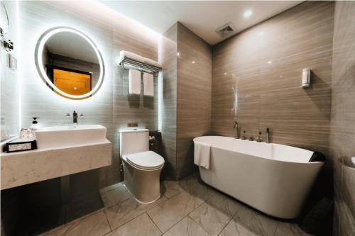 Imagen de la habitación del Hotel Shenzhen Kingkey Kingyu. Foto 19