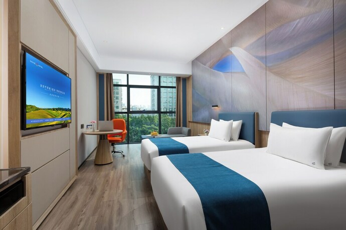 Imagen de la habitación del Hotel Shenzhen Naiwei S Xili Metro. Foto 14