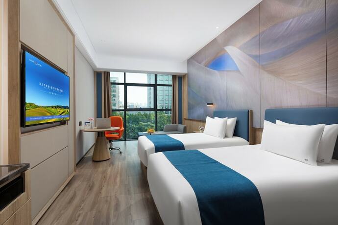 Imagen de la habitación del Hotel Shenzhen Naiwei S Xili Metro. Foto 16