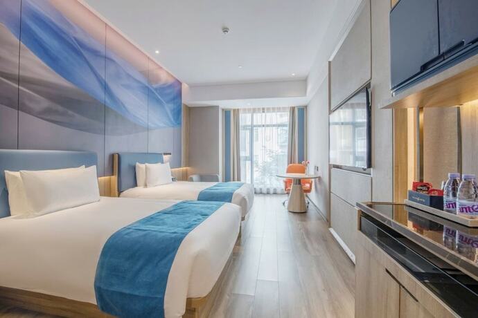 Imagen de la habitación del Hotel Shenzhen Naiwei S Xili Metro. Foto 21