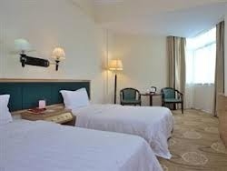 Imagen de la habitación del Hotel Shenzhen Overseas Chinese. Foto 3