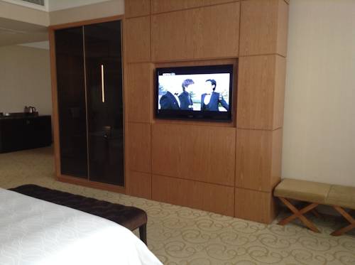 Imagen de la habitación del Hotel Shenzhen Shuidu Holiday, North Railway Station. Foto 4