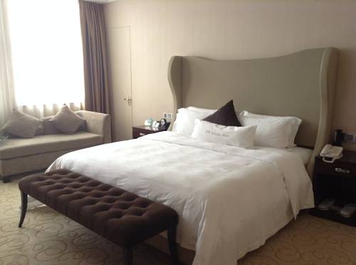 Imagen de la habitación del Hotel Shenzhen Shuidu Holiday, North Railway Station. Foto 9