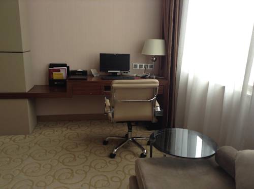 Imagen de la habitación del Hotel Shenzhen Shuidu Holiday, North Railway Station. Foto 10