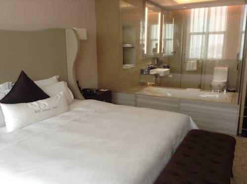 Imagen de la habitación del Hotel Shenzhen Shuidu Holiday, North Railway Station. Foto 11