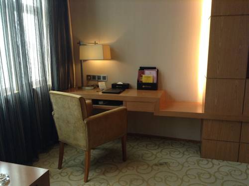 Imagen de la habitación del Hotel Shenzhen Shuidu Holiday, North Railway Station. Foto 14