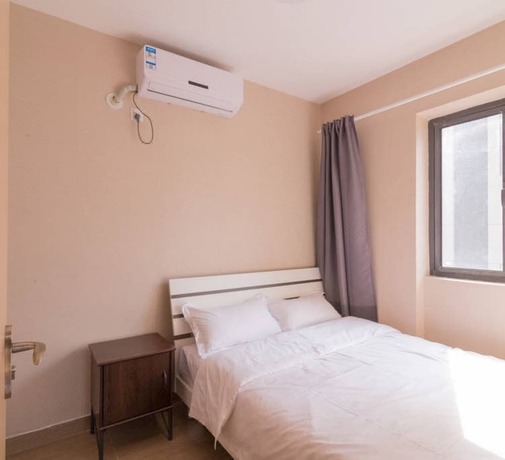 Imagen de la habitación del Hotel Shenzhen Soho Service Apartment. Foto 18