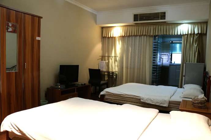 Imagen de la habitación del Hotel Shenzhen Style Apartment. Foto 3