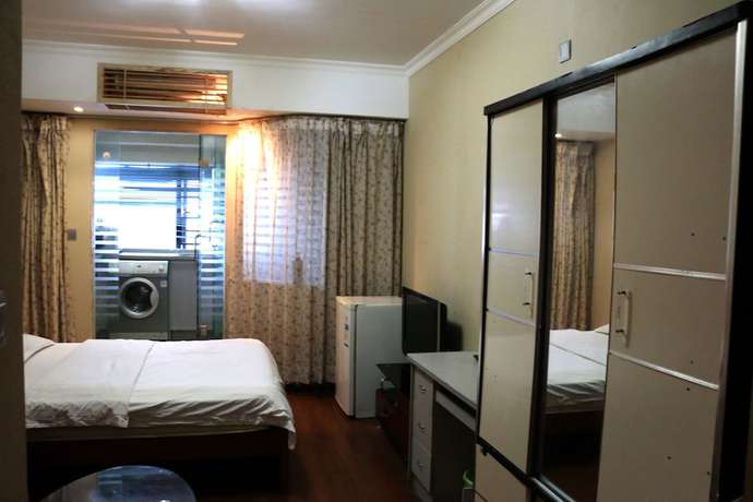 Imagen de la habitación del Hotel Shenzhen Style Apartment. Foto 6