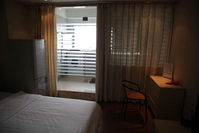 Imagen de la habitación del Hotel Shenzhen Style Apartment. Foto 8
