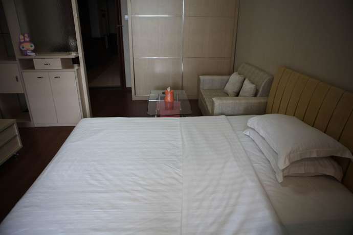 Imagen de la habitación del Hotel Shenzhen Style Apartment. Foto 15