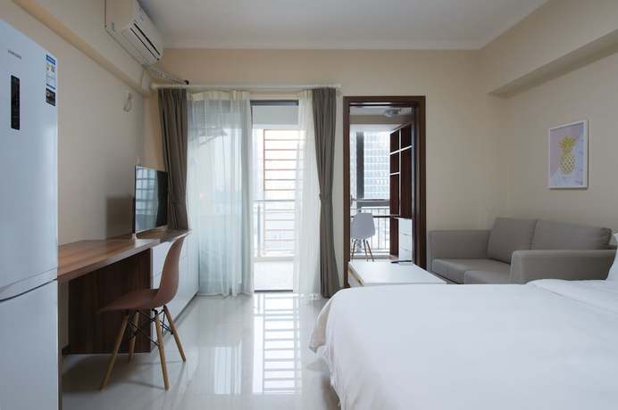 Imagen de la habitación del Hotel Shenzhen T Apartment. Foto 8
