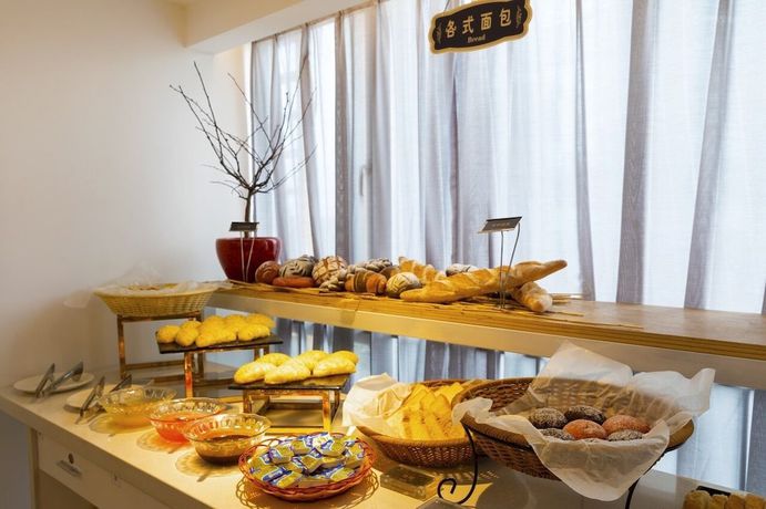 Imagen del bar/restaurante del Hotel Shenzhen T Apartment. Foto 3