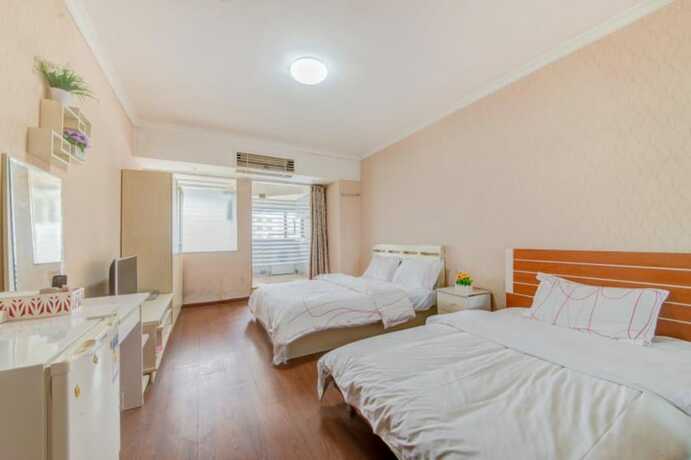 Imagen de la habitación del Hotel Shenzhen Xinjia Business Apartment. Foto 17