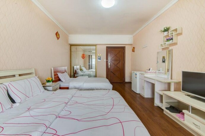 Imagen de la habitación del Hotel Shenzhen Xinjia Business Apartment. Foto 18